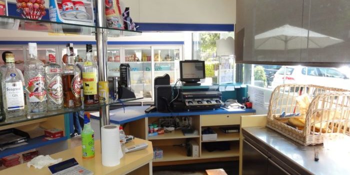 Instalacion cajon inteligente CashGuard Gasolinera Bon Area Telsystem distribuidor oficial instalación de cashguard area servicio